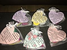 six heart shaped tags with poem on them