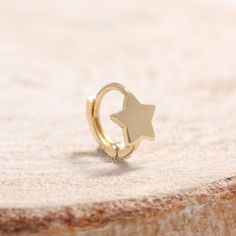 ◐Material◐-14K yellow gold-14K rose gold✔︎choice one◐Style◐-Star/ Crescent✔︎choice one◐Measurement: approx.-internal diameter: 5.5mm-outer diameter: 7.5mm-Star: 5.5mm/ Crescent: 4.2mm x 5.4mm-gauge (thickness): 20g (0.8mm) ◐Materials◐-14K solid gold-Shiny polished-Cubic Zirconia※The listing for 1pcs(one) earring.*Feel free to contact us for more information if needed. Minimalist Star-shaped Single Cartilage Earring, Gold Star Cartilage Earrings Nickel Free, Gold Nickel-free Star Cartilage Earrings, Silver 14k Gold-filled Single Cartilage Earring, Gold Plated Star Shaped Single Earring, Gold Plated Star-shaped Single Earring, Celestial Star Cartilage Earring, Gold Star Cartilage Earrings In Minimalist Style, Gold Star Cartilage Earrings Minimalist Style