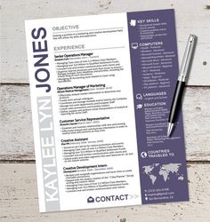 a professional resume is shown on top of a wooden table with a pen next to it