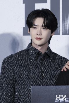 the young man is posing with his award for best male actor in a musical role