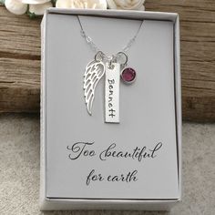 A sterling silver wing necklace with birthstone and personalized name rectangle. This comes in a gift box with a card that reads Too beautiful for earth. The wing charm measures 27mm x 8mm. Also included is a channel drop birthstone in your color choice. This comes with a 16, 18, or Rectangular Birthstone Necklaces For Gifts, Personalized Spiritual Birthstone Necklace As Gift, Personalized Spiritual Birthstone Necklace For Gift, Rectangular Birthstone Necklace For Gift, Personalized Rectangular Jewelry For Memorial, Customizable Sterling Silver Birthstone Necklace For Gifts, Sterling Silver Birthstone Necklace With Birth Flower For Gift, Silver Birthstone Necklace For Gift, Rectangular Hand Stamped Jewelry Gift