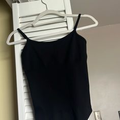 Skims Like Material, Sucks In Stomach For That Hourglass Figure. Size Small But Will Fit An Xs And Medium! Gray And Beige In Brand New Condition And Black One In Excellet Used Condition! Fitted Bodysuit With Adjustable Straps For Loungewear, Fitted Bodysuit With Spaghetti Straps For Loungewear, Casual One-piece Bodysuit With Built-in Bra, Chic Black Seamless Leotard, Fitted Camisole Bodysuit For Loungewear, Fitted Camisole Leotard For Summer, Black Summer Dancewear Bodysuit, Black Dancewear Bodysuit For Summer, Basic Fitted Camisole For Loungewear