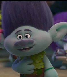 an animated character with purple hair and blue eyes standing in front of other cartoon characters