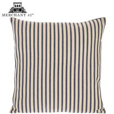 a black and white striped pillow on a white background