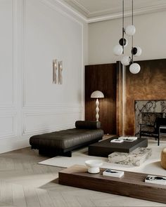 an elegant living room with white walls and wood flooring is furnished with modern furniture