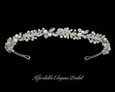 a headband with pearls and crystal stones on the side, along with an inscription that reads