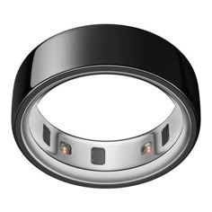 an image of a black and silver ring with three lights on it's side