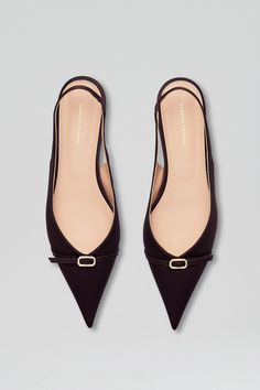 The Satin Slingback interplays timeless elegance with contemporary detailing. Crafted from dark mulberry satin, the kitten heel is designed to a closed pointed toe and showcasing refined buckle detailing. Pair back with denim, leather or dresses for perennial styling.