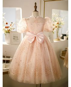 Buy high-end pink tulle with bling sequins girls pageant gown with bubble sleeves at wholesale price online. Free shipping and pro custom service since 2009. Christmas Princess Dress In Pink, Holiday Princess Ball Gown, Princess Style Tulle Gown For Christmas, Christmas Princess Tulle Gown, Pink Princess Dress For Holiday, Pink Princess Pageant Dress For Debutante Ball, Pink Tulle Pageant Dress For Debutante Ball, Holiday Pageant Tulle Gown, Pink Princess Dress For Christmas Pageant