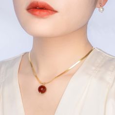 Large gemstone pendant necklace with chic and modern herringbone chain. Choose green jade for wood element, red carnelian for fire element, and white tridacna for metal element. ⚜ Herringbone Gemstone Pendant Necklace ❀ Natural Gemstone 12-14mm❀ Gold Vermeil Herringbone Chain❀ 28 in. with Extension❀ Pendant Chose From Jadeite, Carnelian, and Tridacna Not to be confused with regular gold plating, our vermeil is a thick layer of 18k solid gold on sterling silver. Gold Jade Necklace With Round Pendant, Jade Amulet Pendant Necklace, Jade Pendant Amulet Jewelry, Wood Element, Metal Element, Gold Herringbone Chain, Metal Collar, Chinese Jade Necklace Pendants, Jade Necklace Pendant Chinese