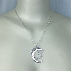 "Sterling silver Celestial Sun, Moon and Star necklace accented with a Swarovski Crystal of your color choice set in a crown bezel setting. All pieces dangle and are independent of each other. The Moon pendant is hand hammered and 1 3/8\" long. All jewelry parts are 925 solid sterling silver. Send jewelry gifts direct with free gift box and note. Available in 16\", 17\", 18\" (model shown), 20\" and 22\" Jan - Garnet Feb - Amethyst March - Aquamarine April - Diamond May - Emerald June - Alexandr Celestial Silver Crystal Necklaces For Jewelry Making, Silver Celestial Crystal Necklaces For Jewelry Making, Silver Sterling Silver Moon Crystal Necklace, Silver Crescent Crystal Necklaces For Jewelry Making, Personalized Sterling Silver Celestial Jewelry, Handmade Celestial Silver Crystal Necklace, Personalized Celestial Sterling Silver Jewelry, Silver Crescent Crystal Necklace In Celestial Style, Personalized Silver Celestial Jewelry