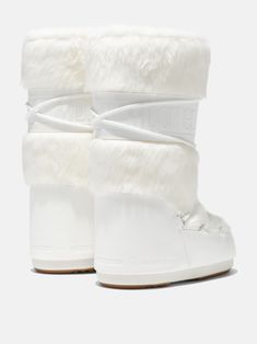 003 OPTICAL WHITE Synthetic->PVC ICON WHITE FAUX-FUR BOOTS from Moon Boot. Boots Moon, Boots Png, Fur Snow Boots, Womens High Boots, Helmet Hat, Faux Fur Hat, Moon Boot, Winter Running, Faux Fur Boots