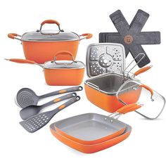 an orange cookware set with utensils and spatulas