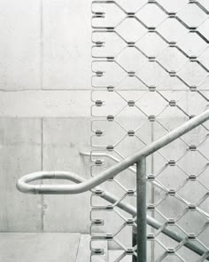 an image of a metal fence with bars on it