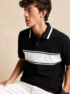 Made from sustainable 100% organic cotton, this sporty pique polo has plenty of style with a racing stripe on the chest and pique stripes to match.  ORGANIC: Made with certified, organically grown cotton that's easier on the earth.  Polo collar with