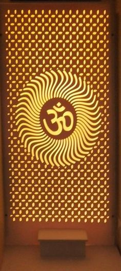 an illuminated sign with the word om on it