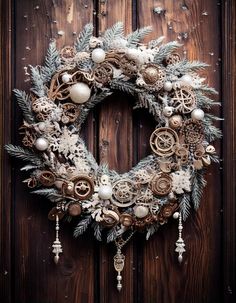 a christmas wreath is hanging on a door with ornaments around it and snowflakes