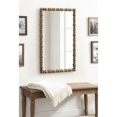 The Kate and Laurel Prindle rectangle mirror features a turned wood design that adds a classic touch to your space. Crafted with the utmost care, the mirror boasts a sturdy wooden material frame that ensures durability and longevity. The frame profile of this wall mirror has a vintage scalloped edge that resembles spindles. Not only is this mirror visually appealing, but it also serves a practical purpose. Hang it in your living room, bedroom, or entryway to create an illusion of a larger space, Baby Boy Nursery Mirror, Boy Nursery Mirror, Living Room Mirror Above Couch, Vintage Mirror Bathroom, Staircase Spindles, Nursery Mirror, Wood And Mirror, Mantel Mirror, Rectangle Wall Mirror