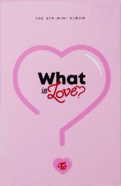 a pink book with the words what is love written on it