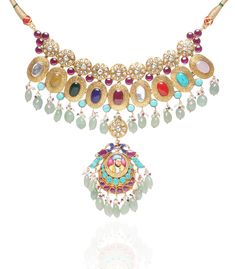 Step into refined elegance with the Jayaswi Navratan kundan necklace set, a breathtaking celebration of color and craftsmanship. Featuring an exquisite arrangement of navratan stones, each with its unique symbolism, this necklace radiates vibrancy and charm. Paired with matching earrings, this set is perfect for enhancing your festive looks, adding a touch of royal elegance to any occasion. Festive Multicolor 22k Gold Bridal Necklace, Fusion Style Kundan Jewelry Sets With Gemstones, Fusion Kundan Gemstone Jewelry Sets, Multicolor 22k Gold Necklaces For Celebration, Fusion Style Multicolor Bridal Necklace With Intricate Design, Elegant Multi-stone Kundan Necklace For Festive Occasions, Multicolor Fusion Bridal Necklace With Intricate Design, Elegant Multicolor Kundan Necklace, Multicolor Cutdana 22k Gold Jewelry