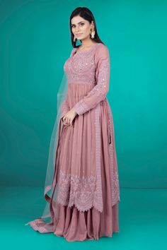 Introducing our elegant Partywear Suit D-116! Featuring a comfortable plazzo and exquisite mirror and thread work, this suit is the perfect choice for any special occasion. Enjoy the blend of traditional and modern designs in this expertly crafted piece. Elevate your style with our Partywear Suit D-116. Semi-stitched Anarkali Suit With Dupatta, Anarkali Semi-stitched Suit With Dupatta, Designer Wear Suits With Resham Embroidery In Traditional Drape, Bollywood Style Palazzo Set With Dabka Work, Maxi Length, Semi-stitched Anarkali Suit With Dabka Work, Pink Palazzo Set With Dori Work For Wedding, Semi-stitched Maxi Palazzo Set With Zari Work, Unstitched Maxi Length Palazzo Set For Eid, Festive Anarkali Suit With Dupatta