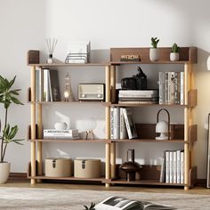 【4 Tier Large Capacity】This 4 tiers open bookshelf is very suitable for storing book, potted plants, magazines, videos, albums, crafts, or other favorite collections, which is a great helper for organizing your items. 【Retractable & Rotatable Design】This shelf measures 55.2“ x 9.5” x 45 “H fully open and 30.7” x 9.5” x 45 fully closed. “H. It can be flexibly divided into different storage areas according to the size of items. With the option of 90 or 180 degree display, this bookshelf is designe Lego Bookshelf, Japandi Bookshelf, Long Bookshelf, Corner Book Shelf, Degree Display, Bookshelf Inspo, Brown Bookcase, Shelves For Living Room, Support Columns