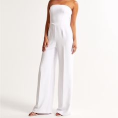 Worn Once, Like Brand New. No Spaghetti Straps. Formal Wide-leg Strapless Jumpsuit For Spring, Formal Strapless Wide Leg Jumpsuit For Spring, Formal Strapless Wide-leg Jumpsuit For Spring, White Summer Evening Pantsuit, Fitted White Strapless Jumpsuit For Spring, White Full-length Pantsuit For Spring, Chic Fitted Wide-leg Jumpsuit, White Full Length Pantsuit For Spring, Chic White Strapless Wide-leg Jumpsuit