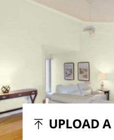 a living room filled with furniture and a white sign that says upload all in front of it