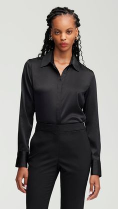 Made of a stretchy silk satin, this slim fit blouse is sure to become a daily favorite. The lightweight, airy silhouette allows for comfortable movement and natural stretch. Easy to tuck and style with your favorite pair of trousers or skirt. Chic Satin Tops For Office Wear, Timeless Silk Tops For Office, Elegant Satin Tops For Workwear, Elegant Satin Tops For Office Wear, Sleek Fitted Blouse For Workwear, Sleek Fitted Blouse For Work, Sleek Solid Blouse For Night Out, Elegant Viscose Blouse For Night Out, Classic Silk Top For Night Out