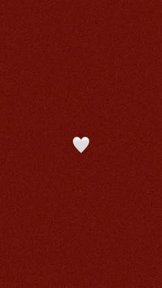 a white heart on a red background