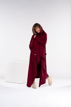 "Extravagant and loose oversize long cardigan cape with two side pockets. The model in the picture is 176cm. ⅼ 5.8 ft. tall and is wearing size S / color: Burgundy 🌟 INFO: * Worldwide EXPRESS shipping - please provide a phone number for shipping documents * US Sizing XS to 4XL - size chart available below - all measurements of the body * We offer customization to Personal Measurements & Larger Sizes 5XL, 6XL, 7XL .... 🌟 MATERIAL & CARE * fabric: acrylic wool cotton mix * hand wash * cold water Oversized Long Sleeve Cape With Pockets, Oversized Long Outerwear With Pockets, Oversized Hooded Cardigan For Layering, Oversized Hooded Outerwear For Layering, Winter Long Sleeve Cape For Layering, Long Sleeve Winter Cape For Layering, Long Sleeve Winter Cape, Oversized Long Coat Cardigan With Pockets, Oversized Winter Outerwear With Batwing Sleeves