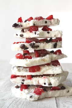 a stack of ice cream and strawberries on top of each other