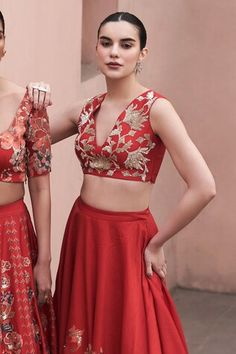 Red bemberg silk lehenga with floral digital printed motifs and sequins embroidery. Comes with a zari embroidered blouse. - Aza Fashions Resham Embroidery Lehenga Sleeveless, Red Designer Wear Choli, Red Sleeveless Choli For Reception, Sleeveless Red Choli For Reception, Sleeveless Floral Embroidery Lehenga, Red Choli With Resham Embroidery, Red V-neck Choli For Wedding, V-neck Choli With Resham Embroidery, Fitted Lehenga With Motifs