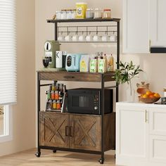 a kitchen area with a microwave, coffee maker and other items