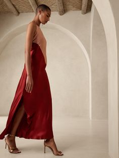 Inspired by the minimalist styles of '90s chic, this meticulously crafted two-toned dress is expertly cut on the bias with strategically-placed diagonal seams for ever-so seductive drape, enhanced by our shimmering silk charmeuse fabric.  COLUMN FIT: Bias Cut Fitted Draped Slip Dress, Fitted Silk Satin Dress With Side Slits, Fitted Draped Bias Cut Slip Dress, Fitted Bias Cut Draped Slip Dress, Elegant Silk Satin Dress With Side Slits, Chic Evening Satin Dress With Side Slits, Chic Satin Evening Dress With Side Slits, Bias Cut Pre-draped Satin Party Dress, Pre-draped Bias Cut Satin Party Dress