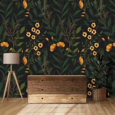 the wallpaper in this living room is painted with yellow flowers and green leaves, along with a wooden chest