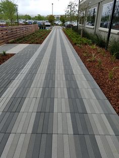 there is a long walkway between two buildings