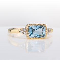 Don't miss this opportunity to own this beautiful gemstone ring! => Gemstone Type - Blue Topaz, Clear Quartz => Gemstone Size - 6*8 mm, 1.75 mm => Gemstone Cut - Faceted => Total Number of Gemstones - 7 => Metal Type - 14k Gold Filled (Tarnish Resistant and Nickel Free) - also available in 925 sterling silver and 14k solid gold ~ Please contact me for pricing on sizes larger than 11 * ~Feel free to ask me about custom made designs. ❏ Replacements and custom orders: ✪ 925 sterling silver - no add Dainty Gold Rings, Blue Stone Ring, Bezel Ring, Ringe Gold, Dainty Ring, Blue Topaz Ring, Topaz Ring, Blue Stone, Clear Quartz