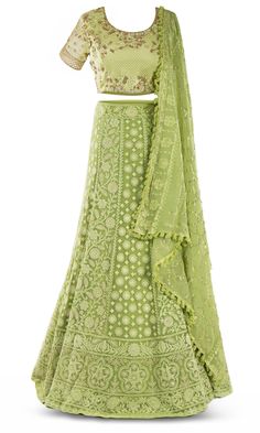 Lime green lehenga paired with a matching skirt with a gorgeous floral pattern garnished in crystals. Green Embellished Semi-stitched Anarkali Set, Bollywood Style Embellished Green Anarkali Set, Green Embellished Sets For Navratri, Festive Embellished Green Sharara, Embellished Green Georgette Anarkali Set, Festive Green Embellished Sharara, Green Embellished Designer Traditional Wear, Green Embellished Anarkali Choli, Embellished Green Traditional Wear For Navratri