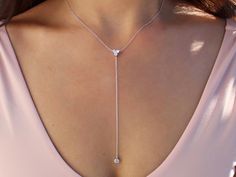 This gorgeous Multi Stone Lariat Necklace is available in 18k gold vermeil and sterling silver. The necklace can be worn on it's own or can easily be layered with other chokers and necklaces. Wear this to any occasion and be ready to shine! This item is also referred to as Y Necklace. MEASUREMENTS The length of the Multi Stone Lariat Necklace is 16 inches around the neck with a 3.5 inch drop and a cubic zirconia charm. Each necklace comes with an additional 2.5-inch extender chain to easily adju Cheap Trendy Formal Necklaces, Cheap Long Party Necklaces, Cheap Long Necklace Perfect For Gifts, Elegant Cheap Dangle Necklaces, Night V Neck Dress Necklace, Cheap Elegant Necklaces With Adjustable Chain, Cheap Formal Single Strand Necklaces, Affordable Elegant Necklace With Adjustable Length, Cheap Single Strand Formal Necklaces