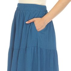 Elevate your fashion game with this flowy and effortlessly chic skirt. This maxi skirt from White Mark boasts a pleated design that adds texture, movement, and a touch of sophistication to your look. Dress it up or down as this skirt is incredibly versatile. Pair it with a tucked in blouse and heels for a sophisticated look or go for a more relaxed vibe with a tucked in tee and sandals and pair it with a jacket on chilly days. It’s perfect for various occasions and style preferences. Chic Solid Color Maxi Skirt For Day Out, Long Pleated Lined Skirt For Day Out, Flowy Rayon Flared Skirt, Chic Solid Color Gathered Maxi Skirt, Flowy Solid Color Skirt For Day Out, Flowy Long Pleated Skirt For Day Out, Relaxed Solid Color Maxi Skirt For Day Out, Relaxed Maxi Skirt For Day Out, Chic Tulle Maxi Skirt