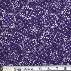 purple bandana fabric with white and blue designs on the front, as well as a ruler