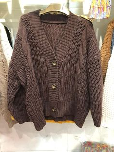 RM55387901816053 The Autumn 2020 Casual Long Sleeve Knitted Sweater is the perfect top for the cold weathers, to keep you all cozy and warm. The sweater is available in 6 different shades: purple, beige, coffee, black, blue, and yellow. It comes in one size that fits all. Pair it up with your favorite pair of jeans and boots, and you will have a great outfit. So go hurry up and add this sweater to your cart right now! Decoration: Buttons Neckline: V-neck Sleeve Length: Full-sleeves Season: Autum Winter Purple Soft Knit Tops, Purple Soft Knit Winter Top, Winter Soft Knit Purple Tops, Brown Winter Sweater Coat For Cold Weather, Thick Long Sleeve Sweater For Fall, Solid Color Chunky Knit Winter Sweater, Brown Winter Cardigan, Solid Color Chunky Knit Sweater For Winter, Brown Cable Knit V-neck Outerwear