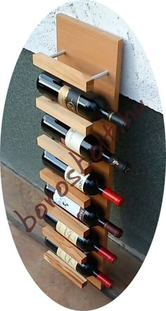 a wooden wine rack holding several bottles of wine