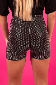 The Rhinestone Queen Shorts are a stylish and comfortable pair of shorts made from a blend of 80% Rayon, 15% Nylon, and 5% Spandex. The fabric blend ensures that the shorts are super stretchy, providing a comfortable and flattering fit. The shorts feature a zip side for easy wear and removal. It's important to note that these shorts run a little small, so customers are advised to size up when ordering to ensure a proper fit. The shorts are adorned with rhinestones, adding a touch of sparkle and School Graduation Outfit, High School Graduation Outfit, Olivia Rodrigo Outfits, Rhinestone Shorts, Rose Boutique, Tour Outfits, Graduation Outfit, High School Graduation, School Graduation