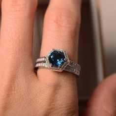 London blue topaz ring engagement ring sterling silver | Etsy White Gold Solitaire Blue Topaz Ring, Elegant Topaz Birthstone Ring For Promise, Topaz Birthstone Ring For Promise With Round Cut, Promise Topaz Birthstone Ring, Classic Topaz Crystal Promise Ring, Sapphire-colored Blue Topaz Ring In Round Cut, White Gold Sterling Silver Topaz Promise Ring, Sapphire Blue Topaz Ring With Round Cut, White Gold Promise Ring With Blue Topaz