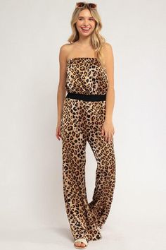 Expertly crafted from high-quality fabric, this Printed Jumpsuit is a stylish and versatile addition to your wardrobe. With its eye-catching print, this jumpsuit is perfect for any occasion - from a casual day out to a formal event. Stay on-trend and effortlessly chic with this must-have piece. - Printed jumpsuit- Strapless- High waistline- Wide leg opening- Cheetah print - Strech satin - Made in U.S.A- Model is 5' 8" 34-24-34 and wearing a Small Style: Casual Print / Pattern: Cheetah print. Silhouette: Wide leg Fit: Regular Neckline: Strapless Lining: No Made In: United States Fabric Contents: 96% Polyester 4% Spandex Stretch fabric. Non-sheer fabric Care Instructions: Machine wash cold, Do not bleach Elegant Loungewear Overalls And Jumpsuits, Chic Overall Jumpsuits And Rompers For Parties, Glamorous Summer Jumpsuits And Rompers For Date Night, Glamorous Jumpsuits And Rompers For Spring Date Night, Sleeveless Printed Jumpsuits And Rompers For Party, Elegant Overall Jumpsuits And Rompers For Day Out, Elegant Jumpsuits And Rompers For Day Out, Elegant Overall Style Jumpsuits For Day Out, Casual Strapless Jumpsuit For Spring Evenings