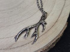 This elegant deer antler pendant was hand carved, then cast in solid sterling silver. Antler silver necklace is the perfect gift for anyone keen on keeping a piece of the natural world close to their heart. Weight - 3.5 g Stainless steel chain with jewelry alloy clasp included as a gift. Length of the chain is 40 cm. This necklace already arrived to the USA and will be shipped to you from PA warehouse via USPS within 1-2 business days after purchasing. Necklace carefully packed in wooden gift box with black sisal filling inside. Feel free to write me any questions! Best regards Anastasia Nature-inspired Hand Cast Necklaces As Gift, Nature-inspired Hand Cast Necklaces For Gift, Silver Rustic Jewelry Gift, Rustic Silver Jewelry For Gift, Rustic Silver Jewelry Gift, Rustic Nickel-free Silver Necklace, Nature-inspired Necklace With Oxidized Finish, Rustic Silver Necklace For Gift, Deer Necklace