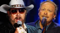 two men in cowboy hats and sunglasses singing into microphones