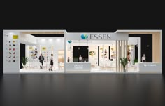 an exhibition stand with people standing in it's stalls and on the side, there is a sign that says essen